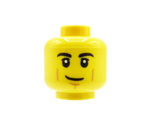 Accéder au produit Tête de figurine LEGO - homme, expression neutre, sourire narquois