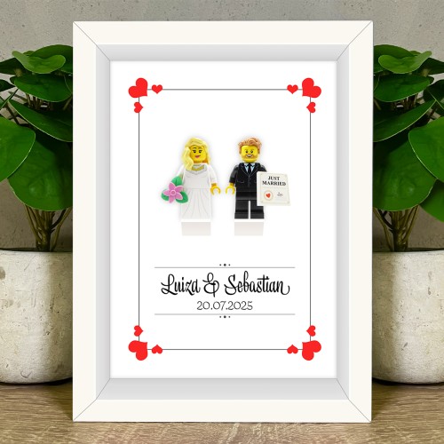 Zum Produkt Brautpaar – Hochzeitsrahmen mit personalisierten Figuren aus LEGO® Teilen
